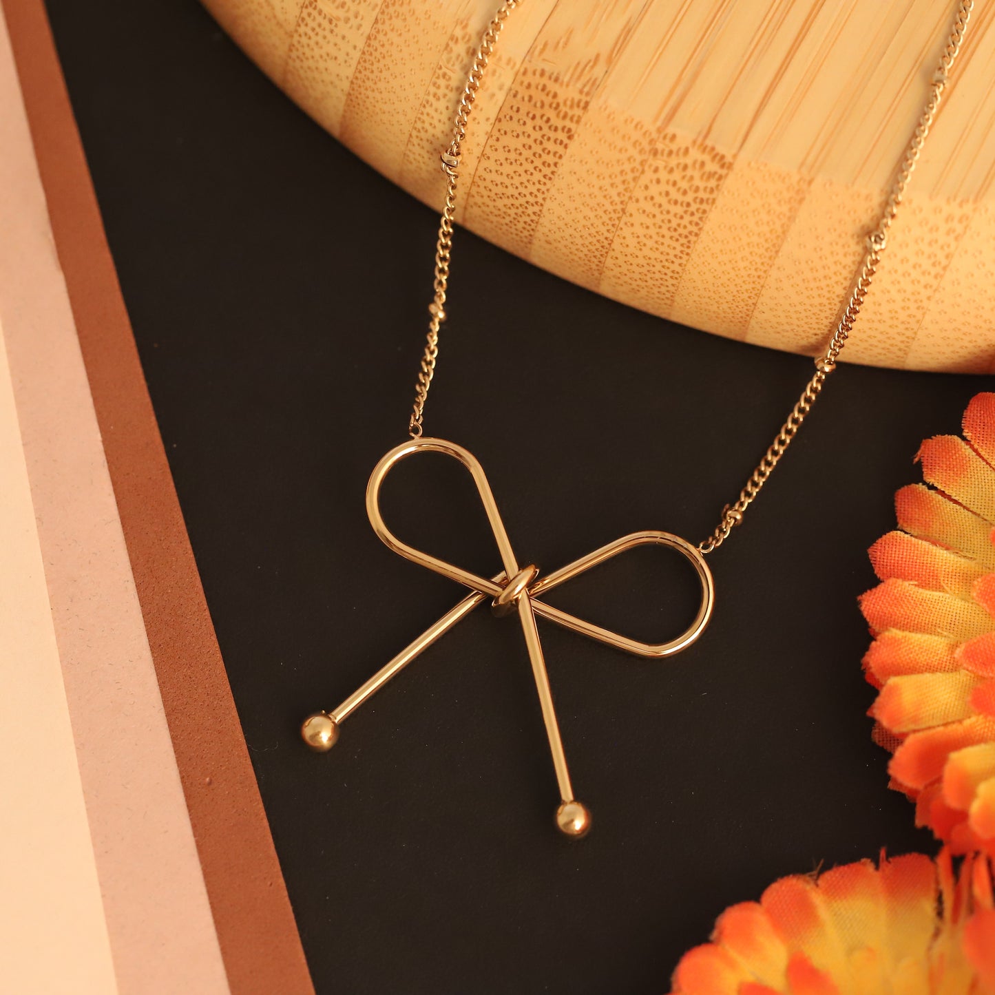 Chic Gold Bow Knot Chain Pendant- Stainless Steel | Dainty & Modern Ribbon Jewelry