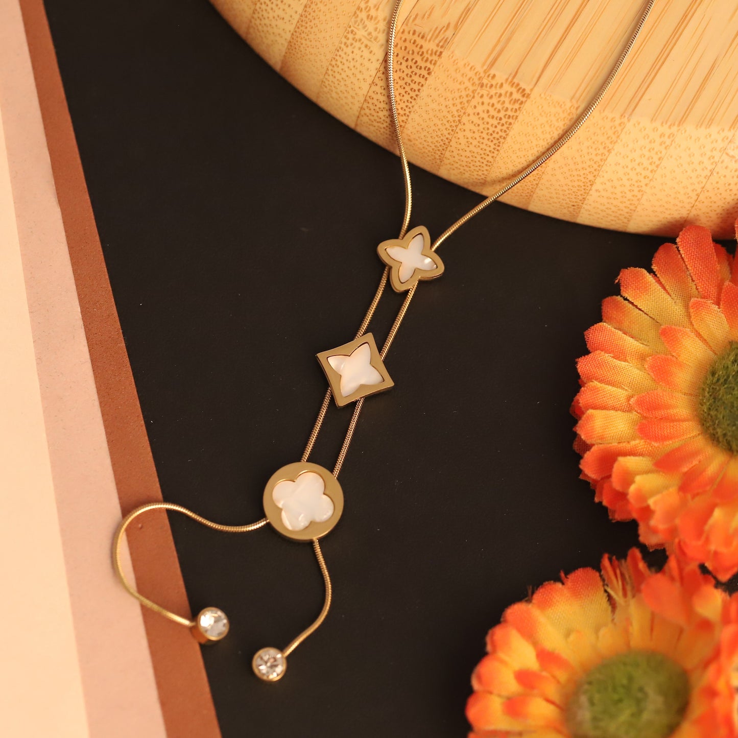 Elegant Gold Y Necklace with Mother of Pearl Clover & Geometric Charms
