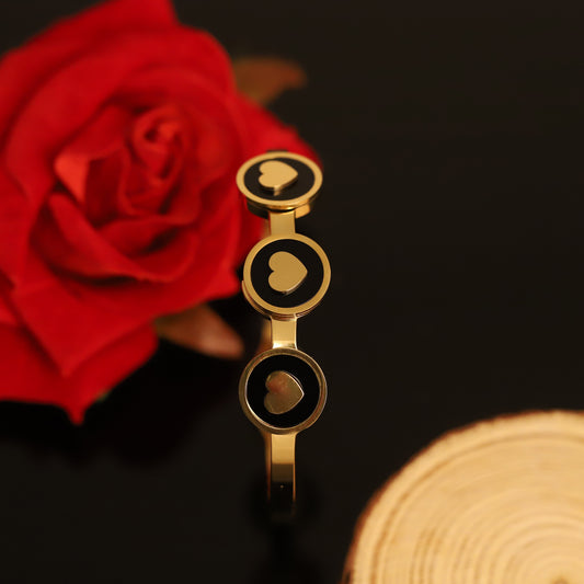 Gold Bangle with Black Enamel Hearts and Circles | Modern Charm Bracelet for Women