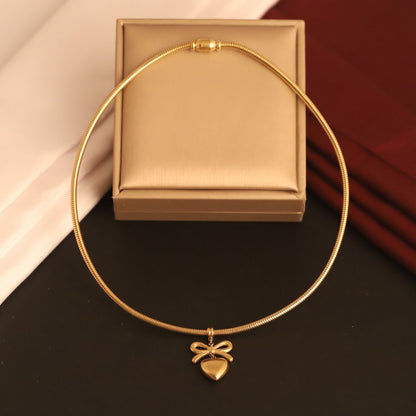 Trending Heart & Bow Pendant Necklace with Magnetic Lock - Unique & Stylish
