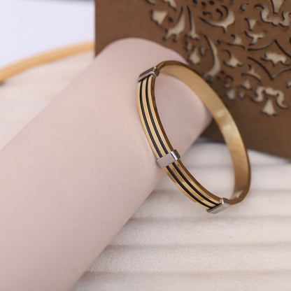 Two-Tone Gold and Black Wire Bangle - Modern, Elegant Bracelet.