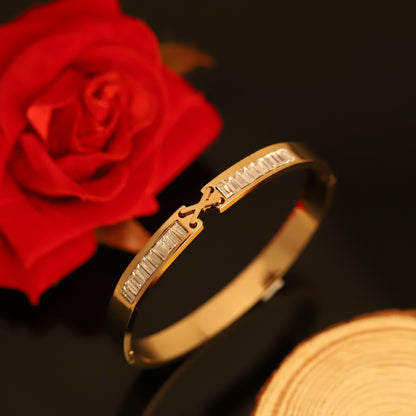 Gold Bangle with Baguette Crystals and Y-shaped Detail - Elegant Women's Bracelet