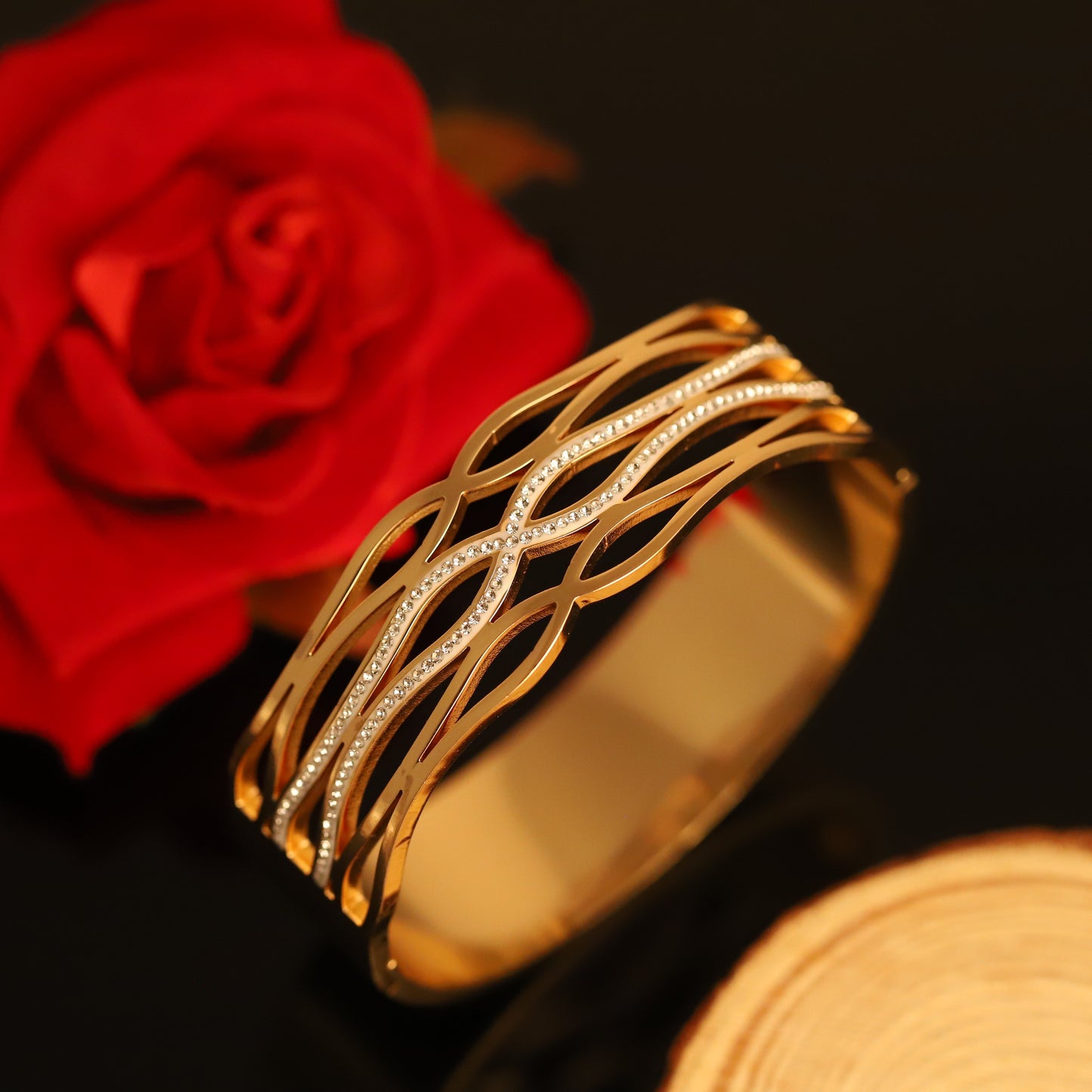 Interlocking Gold Wave Bangle with Crystal Accents - Modern Statement Bracelet