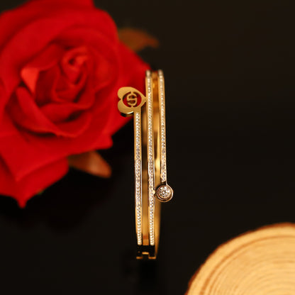 Elegant Gold Layered Bangle with Heart & Crystal Accents