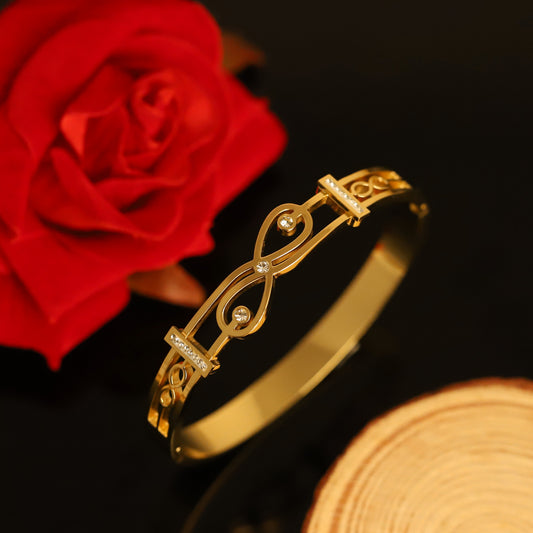 Gold Infinity Symbol Bangle with Crystal Accents - Elegant Openwork Bracelet