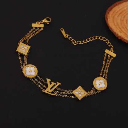 Layered Gold Bracelet with Mother of Pearl Clovers & LV Inspired Monogram | Statement Jewelry