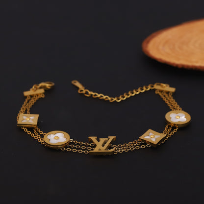 Layered Gold Bracelet with Mother of Pearl Clovers & LV Inspired Monogram | Statement Jewelry