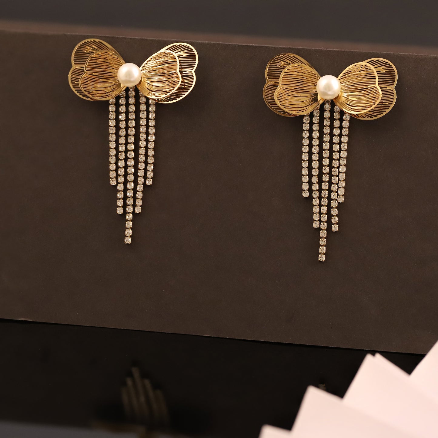 Golden Bow Stud Earrings with Faux Pearl and Cubic Zirconia Tassels - Glamorous Women's Jewelry