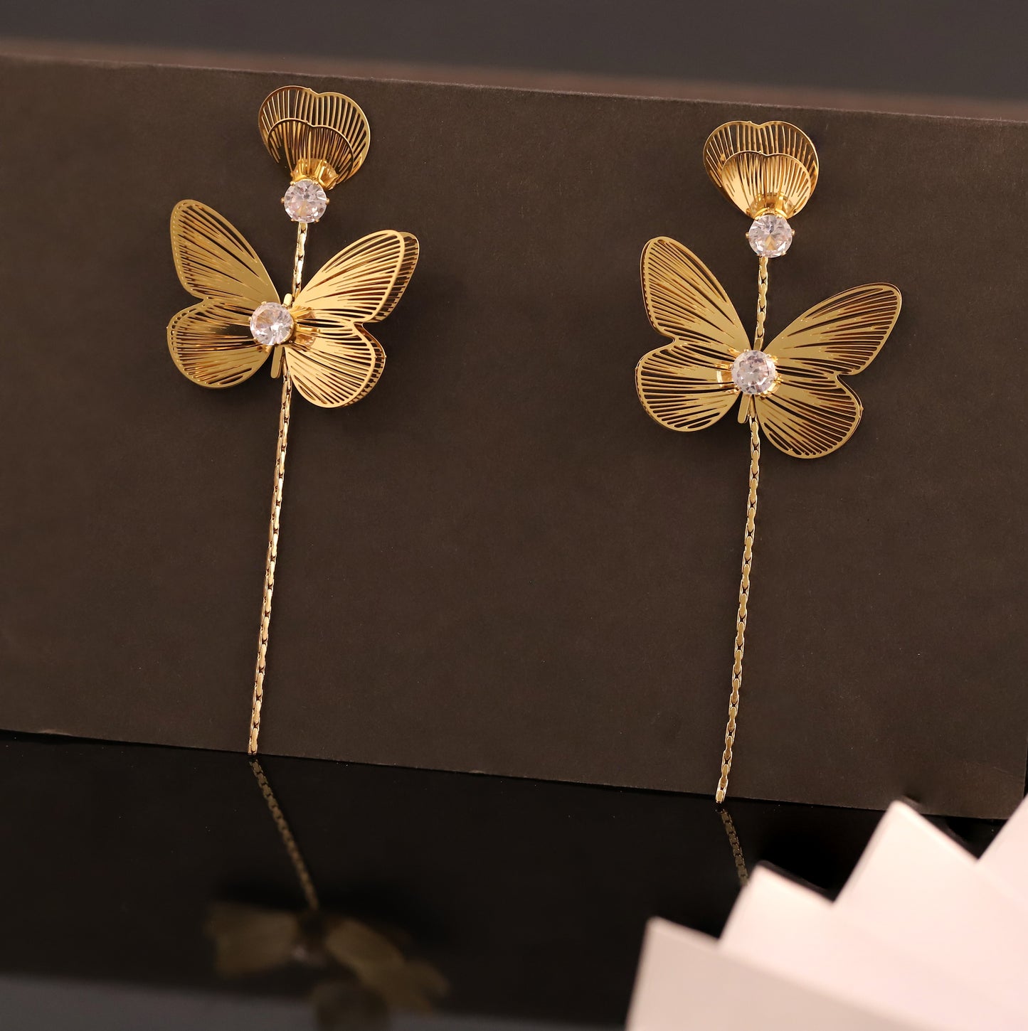 Golden Butterfly and Bud Drop Earrings with Sparkling Accents - Elegant Nature-Inspired Jewelry