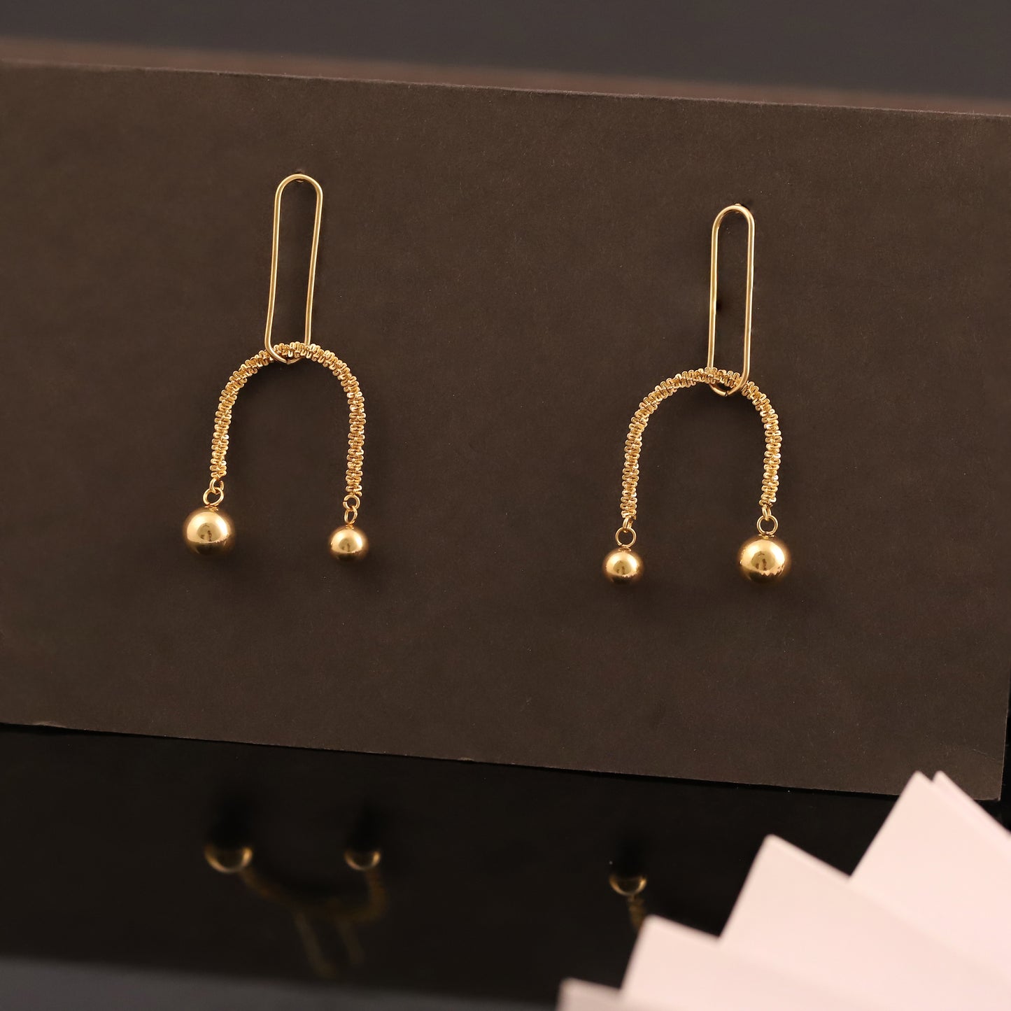 Modern Gold U-Shape Drop Earrings with Textured Detail & Ball Ends