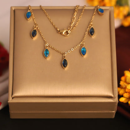 Gold Tone Dangle Gemstone Tanmaniya | Teardrop Blue Crystal Pendant | Delicate Layering Jewellery