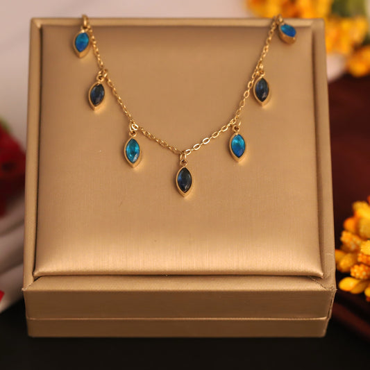 Gold Tone Dangle Gemstone Tanmaniya | Teardrop Blue Crystal Pendant | Delicate Layering Jewellery