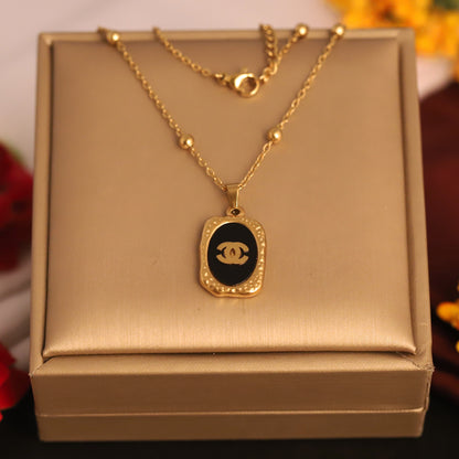 Black Enamel Oval Logo Pendant Necklace | Gold Designer Inspired Jewelry