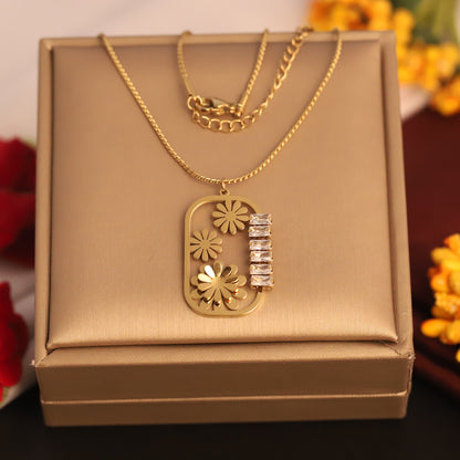 Floral & Baguette Crystal Pendant Necklace | Gold Statement Jewelry