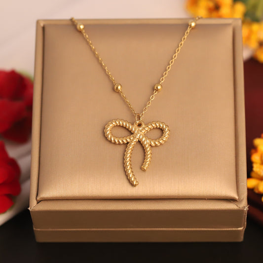 Textured Rope Bow Pendant Necklace | Gold Beaded Jewelry