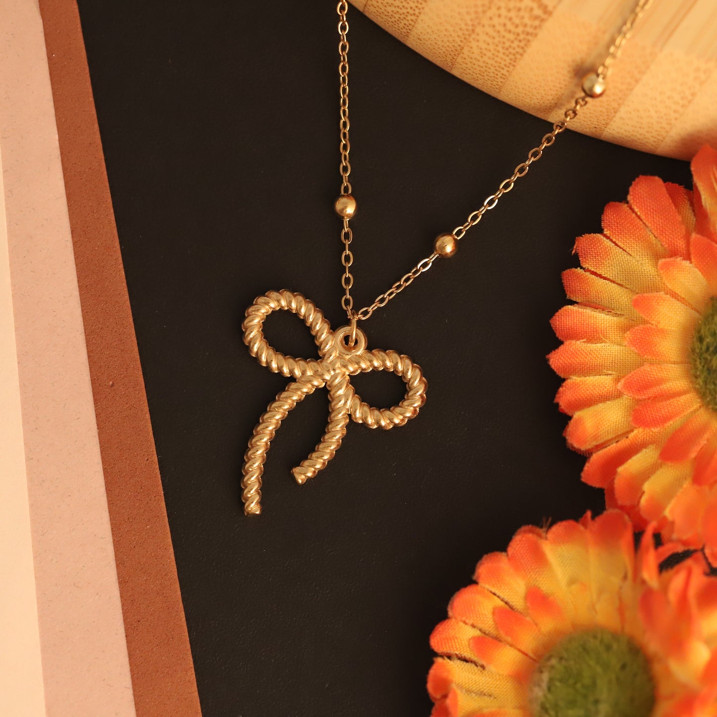 Textured Rope Bow Pendant Necklace | Gold Beaded Jewelry