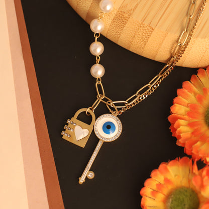 Layered Key & Lock Charm Necklace | Gold Pearl Asymmetrical Jewelry