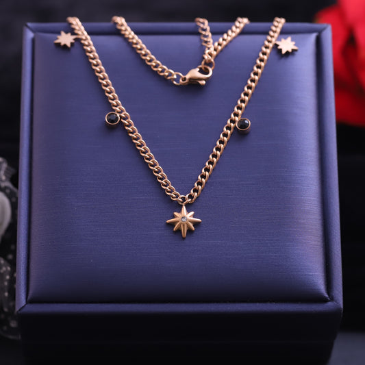 Rose Gold North Star Necklace with Black Gem Accents - Celestial Pendant