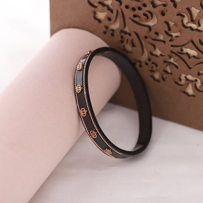 Black & Gold Interlocking G Bangle