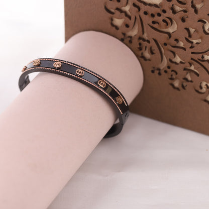 Black & Gold Interlocking G Bangle