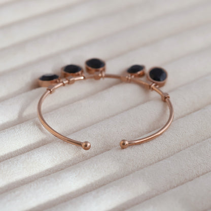 Sleek Rose Gold Plated Kada Bracelet with Black Stone Charms