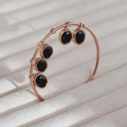 Sleek Rose Gold Plated Kada Bracelet with Black Stone Charms