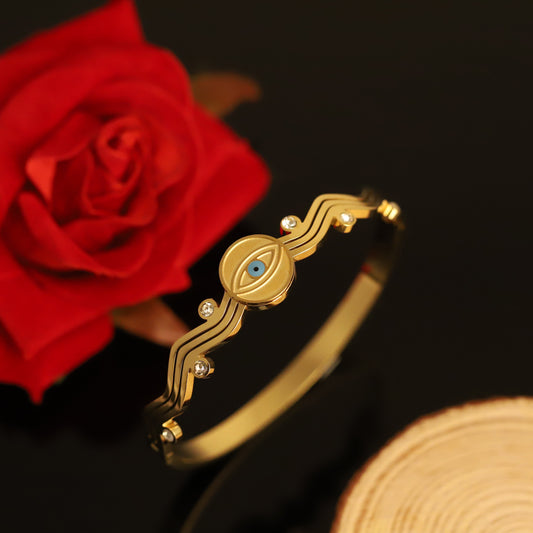 Gold Evil Eye Bangle Bracelet - Diamond Accents & Wave Design