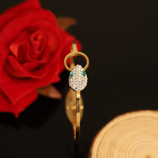 Elegant Gold Snake Bangle Bracelet with Crystal Pave and Emerald Eyes | Statement Jewelry