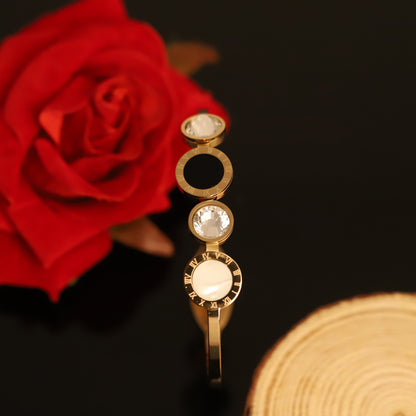 Gold Geometric Bangle with Crystal, Black, and White Accents | Contemporary Women's Bracelet