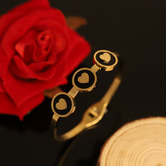 Gold Bangle with Black Enamel Hearts and Circles | Modern Charm Bracelet for Women