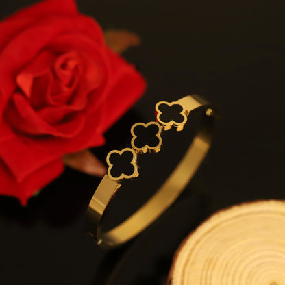 Chic Gold Bangle with Black Clover Charms | Minimalist Statement Bracelet for Women
