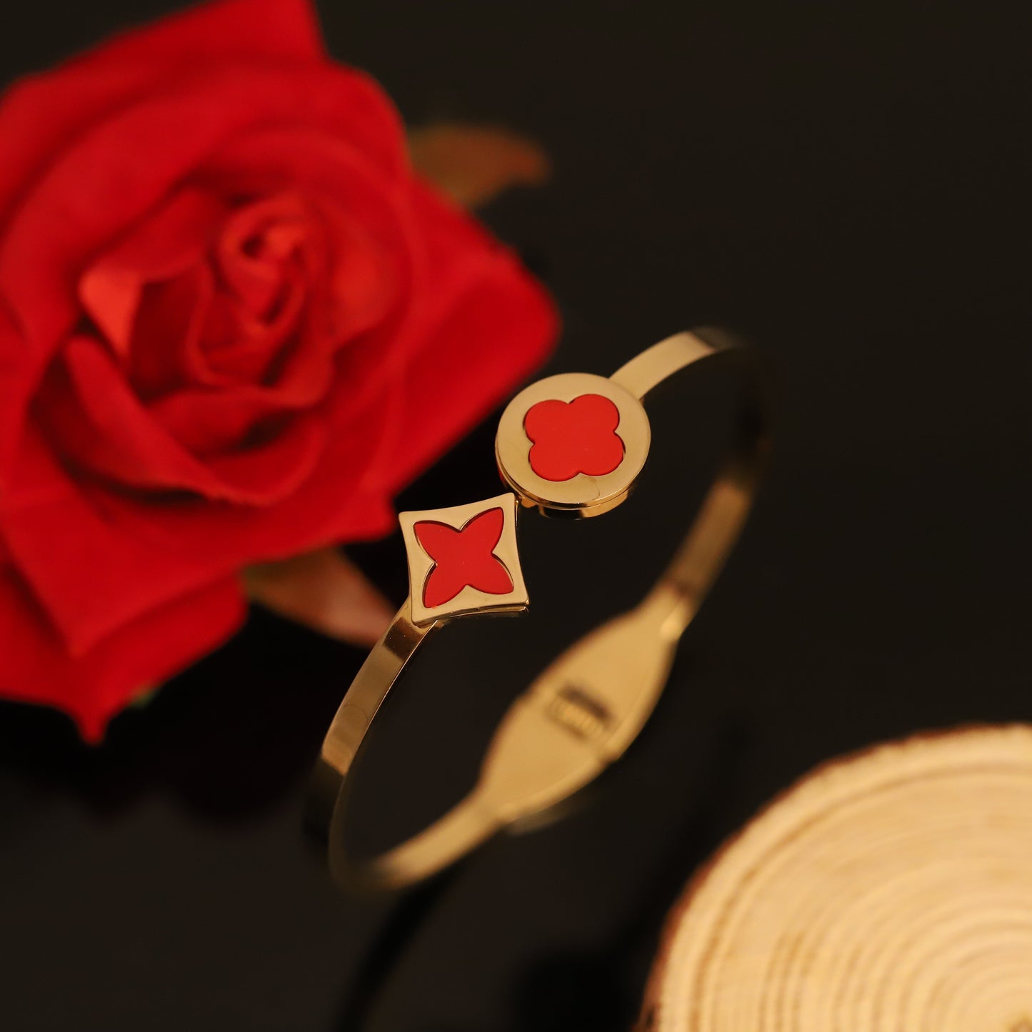 Gold Bangle with Red Clover & Quatrefoil Charms - Elegant Open Cuff Bracelet