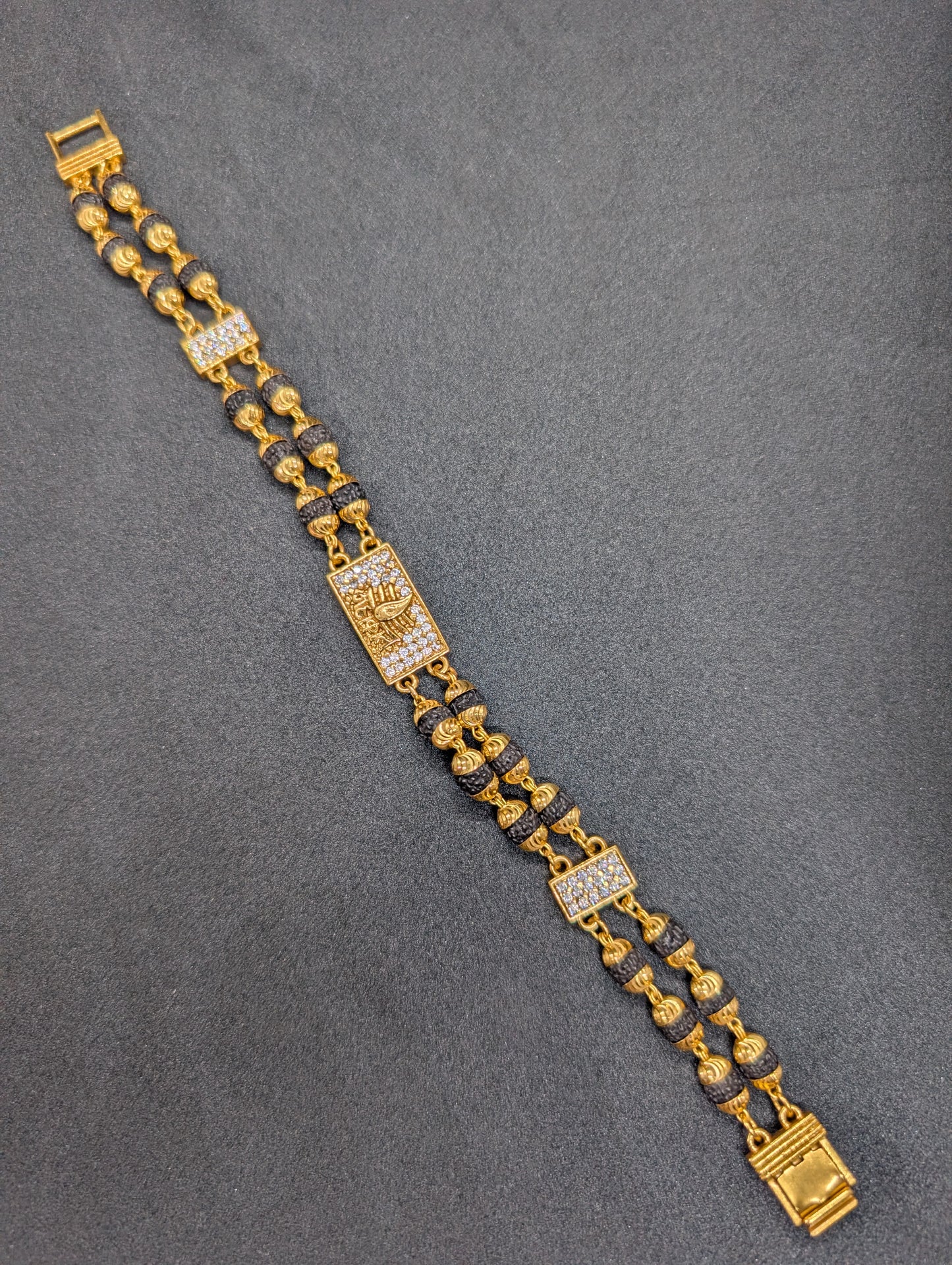 Gold & Rudraksha Beaded Bracelet with Diamond-Studded Spiritual Motif
