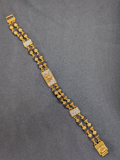 Gold & Rudraksha Beaded Bracelet with Diamond-Studded Spiritual Motif